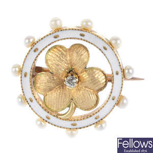 An early 20th century diamond enamel and seed pearl brooch.