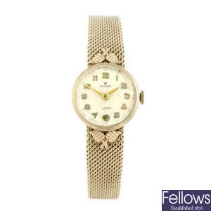 ROLEX - a lady's 9ct yellow gold bracelet watch.