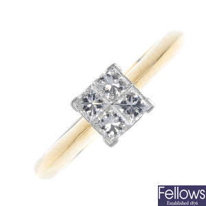 A diamond four-stone dress ring.