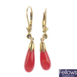 Two pairs of coral earrings.