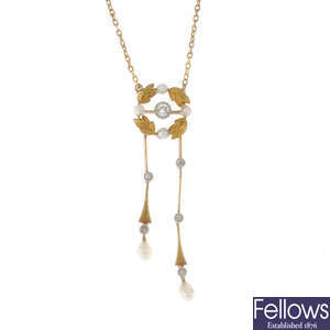 An early 20th century 14ct gold diamond and seed pearl pendant, on chain.