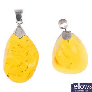Two natural Dominican amber pendants.