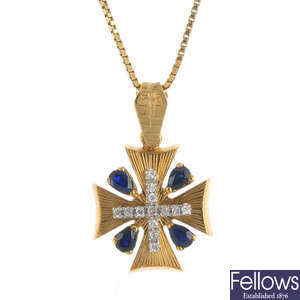 A diamond and sapphire cross pendant, with chain.