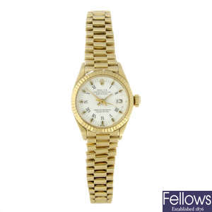ROLEX - a lady's yellow metal Oyster Perpetual Datejust bracelet watch.