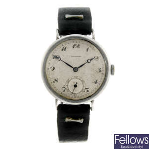 LONGINES - a gentleman's white metal wrist watch.