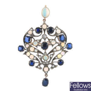 A sapphire, opal and diamond pendant.
