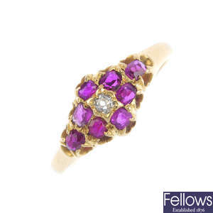 An early 20th century gold ruby and diamond cluster ring.
