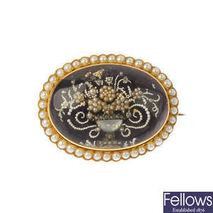 A late Georgian gold diamond, mother-of-pearl and split pearl memorial brooch, circa 1830.