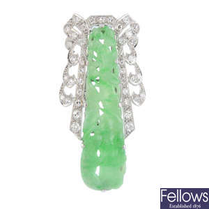 A jade and diamond clip.