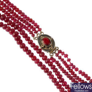 A ruby three-row necklace.