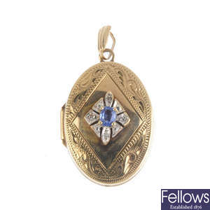 Five gem-set pendants and a chain.