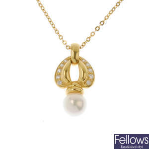 MIKIMOTO - a diamond and cultured pearl pendant.