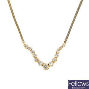 A diamond necklace, on chain.