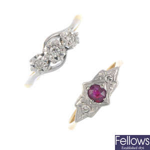 Two mid 20th century platinum and 18ct gold diamond and ruby rings.