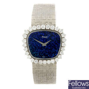 PIAGET - a lady's 18ct white gold bracelet watch.