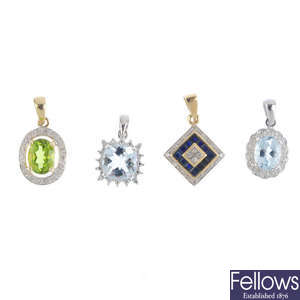 Five 9ct gold diamond and gem-set pendants.