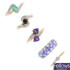 Four 9ct gold diamond and gem-set rings and a diamond ring.