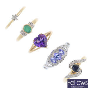 Four 9ct gold diamond and gem-set rings and a diamond ring.