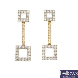 A pair of 9ct gold diamond earrings.