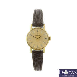 OMEGA - a lady's gold plated Genève wrist watch.