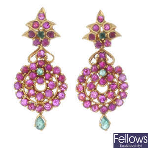 A pair of ruby and emerald earrings.