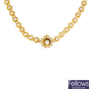 A late Victorian split and seed pearl floral necklace, circa 1880.