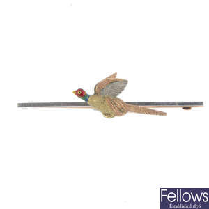 A mid 20th century 15ct gold and platinum enamel pheasant brooch.
