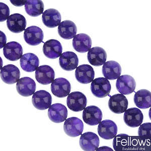 Twenty-five gemstone bead strands.