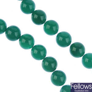 Twenty-four gemstone bead strands and a small selection of loose beads.