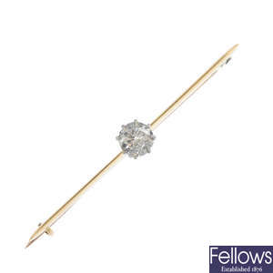A diamond single-stone brooch. 