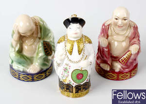Three Royal Worcester Connoisseur Collection porcelain candle snuffers.