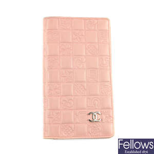CHANEL  - an embossed logo wallet.