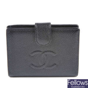 CHANEL - a caviar leather wallet.
