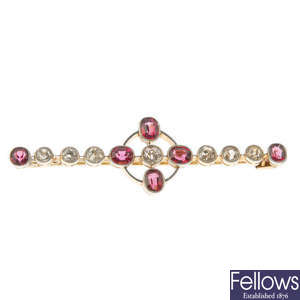 An early 20th century gold spinel and diamond brooch.