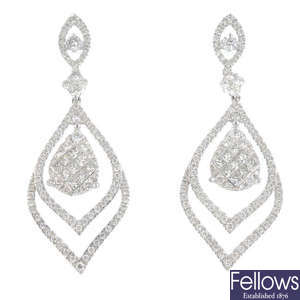 A pair of 18ct gold diamond pendant earrings.