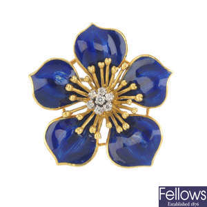 An 18ct gold diamond and enamel floral brooch.