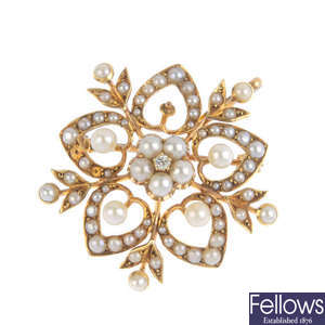 An early 20th century gold split pearl and diamond brooch.