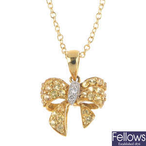 An 18ct gold sapphire and diamond pendant, with chain.