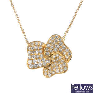 An 18ct gold diamond pendant, on chain.