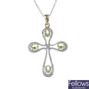 A 9ct gold peridot and diamond pendant, with chain.