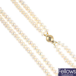 Three cultured pearl necklaces and a bracelet.