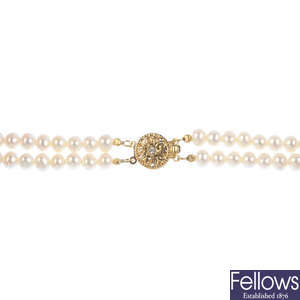A cultured pearl necklace and three cultured pearl bracelets.