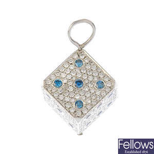A diamond and colour treated 'blue' diamond die pendant.