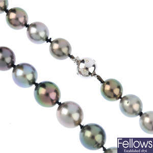 A Tahitian cultured pearl single-strand necklace, with 18ct gold diamond clasp.