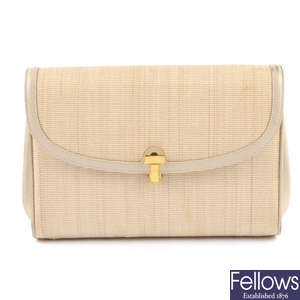 TIFFANY & CO. - a beige handbag.