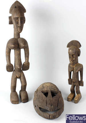 Two African tribal art figures and a mask