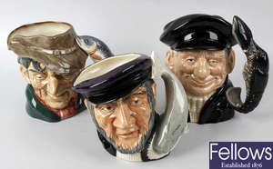 A group of eight Royal Doulton character jugs.