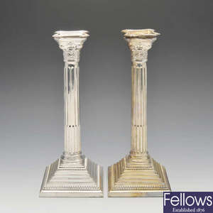 A pair of 1920's silver candlesticks.