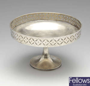 A continental silver tazza, plus a dish and set of coasters.