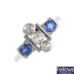 A mid 20th century 18ct gold sapphire and diamond dress ring.